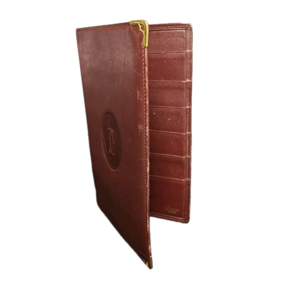 CARTIER AUTHENTIC BI-FOLD LONG LEATHER WALLET / PASSPORT PREOWNED BORDEAUX RED